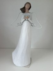 Anděl stojící bílý se stříbrnou hvězdou nebo srdcem